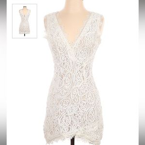 A. peach white dress bought from nasty gal